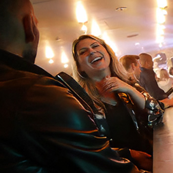 Economic Development Stamford CT, GenX couple at upscale crowded bar/restaurant -Frank Marchese Photography